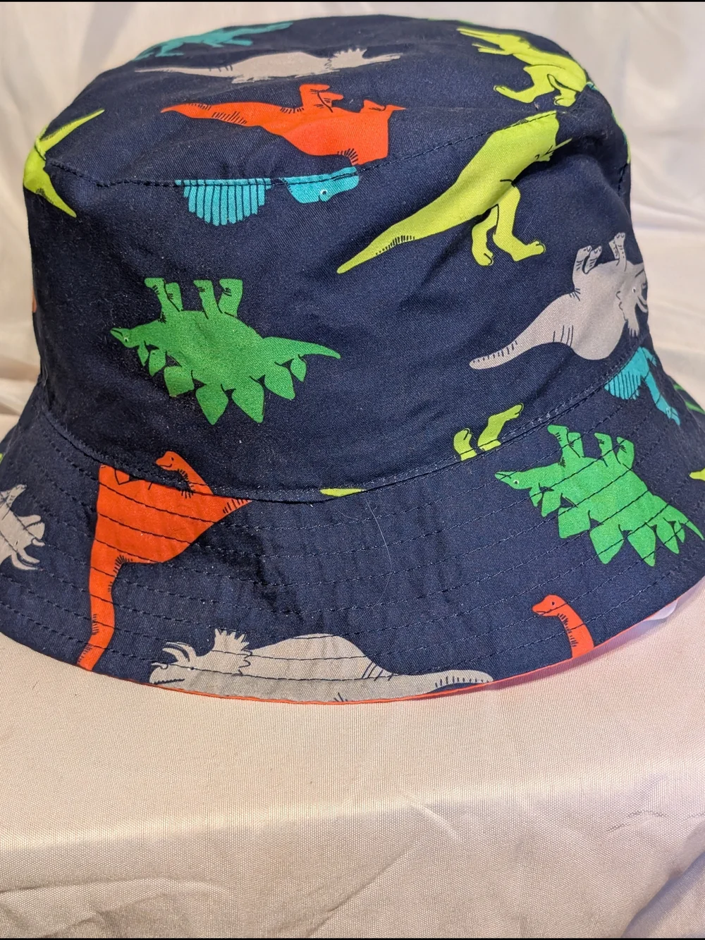 Carter's  Reversible Navy Bucket Hat with Bright Dinosaur Prints